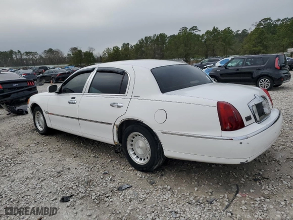 2001 Lincoln Town Car Executive with VIN 1LNHM81W91Y650775, listed as a Copart auction lot 47074385 with 141,344 mi miles and Salvage Title. Bid and sale history available at carsss.com. Image 2.