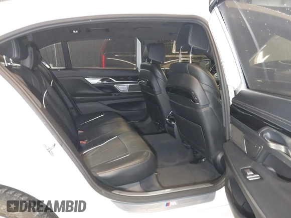 2016 BMW 7 Series 750i xDrive with VIN WBA7F2C59GG419656, listed as a IAAI auction lot 42118092 with 108,560 mi miles and . Bid and sale history available at DreamBid. Image 8.