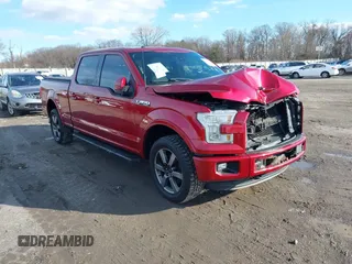 2015 Ford F-150 XLT w/HD Payload Pkg with VIN 1FTFW1EF2FFB76243, listed as a IAAI auction lot 41150866 with 124,478 mi miles. Bid and sale history available at carsss.com. Image 1.