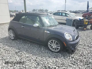 2012 MINI Convertible S with VIN WMWZP3C56CT250886, listed as a Copart auction lot 50027405 with 92,990 mi miles and Salvage title. Bid and sale history available at DreamBid. Image 4.