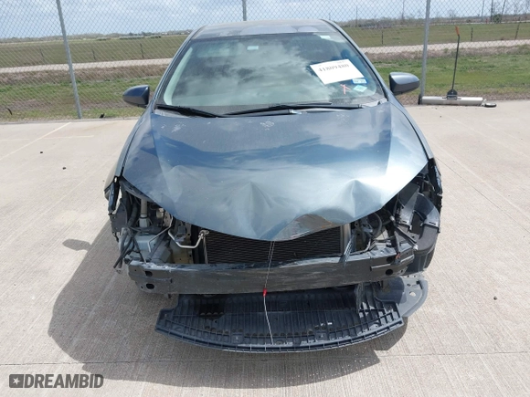 2016 Toyota Corolla L with VIN 5YFBURHE9GP376830, listed as a IAAI auction lot 41809480 with 106,922 mi miles. Bid and sale history available at carsss.com. Image 12.