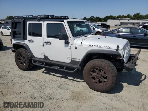 2014 Jeep Wrangler Unlimited Rubicon with VIN 1C4BJWFG0EL201559, listed as a Copart auction lot 59580575 with 182,101 mi miles and Salvage title. Bid and sale history available at DreamBid. Image 4.