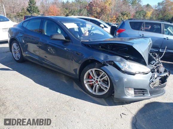 2013 Tesla Model S Performance with VIN 5YJSA1DP7DFP11737, listed as a IAAI auction lot 40915195 with Not provided miles and . Bid and sale history available at DreamBid. Image 1.