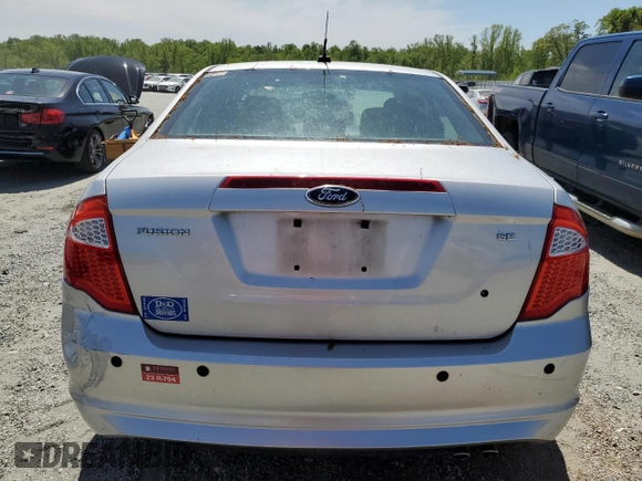 2012 Ford Fusion SE with VIN 3FAHP0HA2CR316408, listed as a Copart auction lot 52747515 with 143,948 mi miles and Salvage Title. Bid and sale history available at DreamBid. Image 6.
