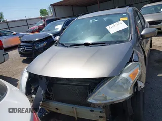 2016 Nissan Versa SV with VIN 3N1CN7AP3GL869789, listed as a IAAI auction lot 41997640 with 208,817 mi miles and . Bid and sale history available at DreamBid. Image 13.