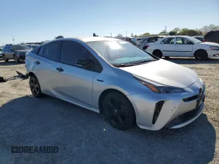 2022 Toyota Prius L Eco with VIN JTDKAMFU6N3174068, listed as a Copart auction lot 50403295 with 102,265 mi miles and Salvage Title. Bid and sale history available at DreamBid. Image 4.