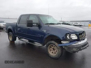 2003 Ford F-150 XLT with VIN 1FTRW08L33KC62060, listed as a IAAI auction lot 41618936 with 276,251 mi miles. Bid and sale history available at carsss.com. Image 1.