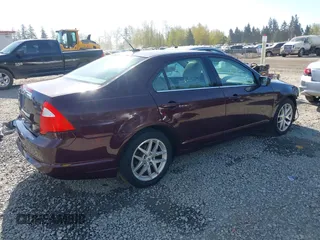 2011 Ford Fusion SEL with VIN 3FAHP0JA7BR220265, listed as a IAAI auction lot 42019909 with 170,287 mi miles. Bid and sale history available at carsss.com. Image 4.