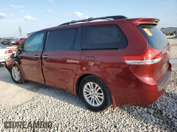 2012 Toyota Sienna XLE AAS with VIN 5TDYK3DC8CS192241, listed as a Copart auction lot 50985055 with Not provided miles and Salvage title. Bid and sale history available at DreamBid. Image 2.