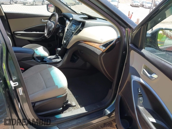 2014 Hyundai Santa Fe with VIN 5XYZUDLB9EG169614, listed as a IAAI auction lot 42208166 with 139,103 mi miles and . Bid and sale history available at DreamBid. Image 5.