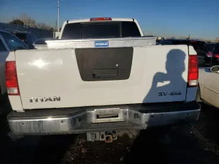 2012 Nissan Titan SV with VIN 1N6AA0EC1CN326088, listed as a Copart auction lot 42799335 with 163,218 mi miles and Salvage Title. Bid and sale history available at carsss.com. Image 6.