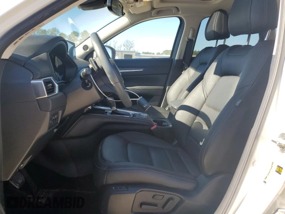 2021 Mazda CX-5 Grand Touring with VIN JM3KFBDM0M1440565, listed as a Copart auction lot 87089404 with 34,607 mi miles and Salvage Title. Bid and sale history available at carsss.com. Image 7.