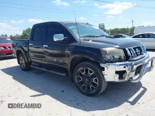 2008 Nissan Titan XE with VIN 1N6BA07D18N334418, listed as a IAAI auction lot 41916303 with 224,009 mi miles. Bid and sale history available at carsss.com. Image 1.