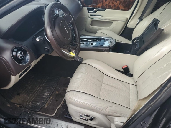 2013 Jaguar XJ with VIN SAJWA1C70D8V41578, listed as a Copart auction lot 89080585 with 76,063 mi miles and Salvage Title. Bid and sale history available at DreamBid. Image 7.