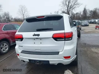 2015 Jeep Grand Cherokee Altitude with VIN 1C4RJFAG7FC954853, listed as a IAAI auction lot 40988796 with 107,002 mi miles. Bid and sale history available at carsss.com. Image 16.