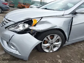 2013 Hyundai Sonata SE with VIN 5NPEC4AC4DH710329, listed as a IAAI auction lot 41849429 with 104,607 mi miles. Bid and sale history available at carsss.com. Image 6.