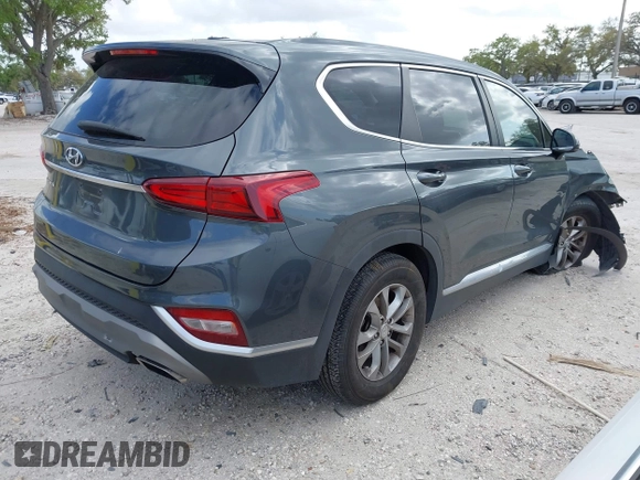 2019 Hyundai Santa Fe SE with VIN 5NMS23AD9KH037136, listed as a IAAI auction lot 41744001 with 150,745 mi miles. Bid and sale history available at carsss.com. Image 4.
