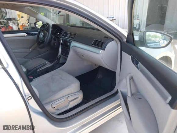 2016 Volkswagen Passat 1.8T S with VIN 1VWAS7A38GC031521, listed as a IAAI auction lot 42069429 with 94,938 mi miles. Bid and sale history available at carsss.com. Image 5.