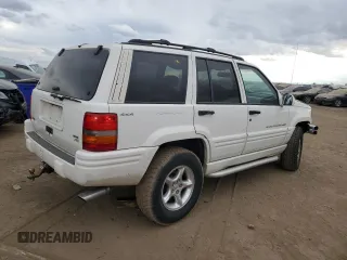 1998 Jeep Grand Cherokee Limited with VIN 1J4GZ88Z4WC164505, listed as a Copart auction lot 76843304 with 0 mi miles and Salvage Title. Bid and sale history available at carsss.com. Image 3.