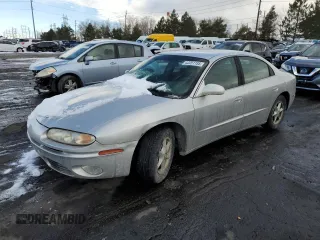 2001 Oldsmobile Aurora z VIN 1G3GR64H214121887, wystawiony jako Copart lot #42251155 z przebiegiem 120 774 mil mil oraz Szkoda całkowita • Salvage title. Historia ofert i sprzedaży dostępna na DreamBid. Obrazek 1.