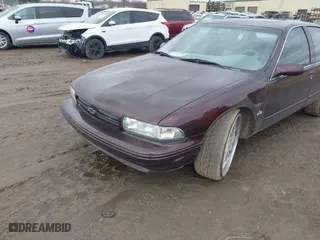 1995 Chevrolet Caprice Classic with VIN 1G1BL52P8SR170010, listed as a IAAI auction lot 41733104 with 116,742 mi miles. Bid and sale history available at carsss.com. Image 2.
