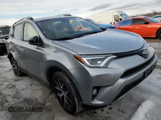 2018 Toyota RAV4 Hybrid SE z VIN JTMJJREV0JD246230, wystawiony jako Copart lot #89095135 z przebiegiem Nie podano mil oraz Szkoda całkowita • Salvage title. Historia ofert i sprzedaży dostępna na DreamBid. Obrazek 4.