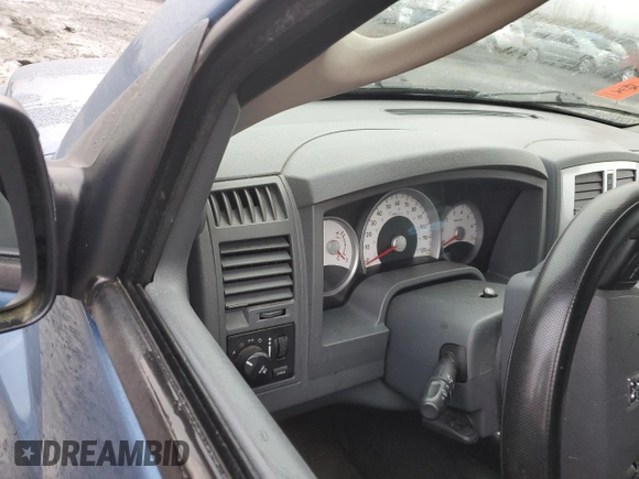 2005 Dodge Dakota Laramie with VIN 1D7HW58N35S225612, listed as a Copart auction lot 83990174 with Not Provided miles and Salvage Title. Bid and sale history available at DreamBid. Image 9.