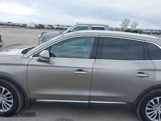 2016 Lincoln MKX Select with VIN 2LMTJ8KR9GBL57397, listed as a IAAI auction lot 42104585 with 286,562 mi miles. Bid and sale history available at carsss.com. Image 14.