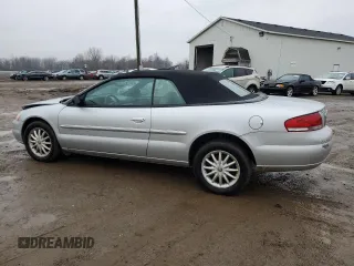 2001 Chrysler Sebring LXi z VIN 1C3EL55UX1N556511, wystawiony jako Copart lot #81047244 z przebiegiem 83 830 mil mil oraz Czysty tytuł • Clean title. Historia ofert i sprzedaży dostępna na DreamBid. Obrazek 2.