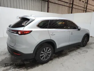 2023 Mazda CX-9 Touring with VIN JM3TCBCY9P0656636, listed as a Copart auction lot 64243905 with 59,788 mi miles and Non repairable. Bid and sale history available at DreamBid. Image 3.