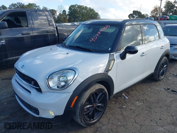 2015 MINI Countryman S with VIN WMWZC3C5XFWT06360, listed as a IAAI auction lot 40774863 with 127,383 mi miles and . Bid and sale history available at DreamBid. Image 2.
