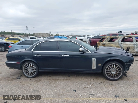 2007 Jaguar XJ with VIN SAJXA73C97TH14362, listed as a IAAI auction lot 41305716 with 120,924 mi miles and . Bid and sale history available at DreamBid. Image 13.