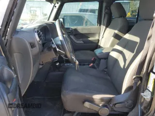 2016 Jeep Wrangler Unlimited Sport z VIN 1C4BJWDG5GL134169, wystawiony jako Copart lot #53517145 z przebiegiem 129 824 mil mil oraz Szkoda całkowita • Salvage title. Historia ofert i sprzedaży dostępna na DreamBid. Obrazek 7.