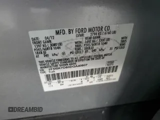 2013 Ford Explorer XLT z VIN 1FM5K7D80DGA40807, wystawiony jako Copart lot #54357115 z przebiegiem 123 444 mil mil oraz Szkoda całkowita • Salvage title. Historia ofert i sprzedaży dostępna na DreamBid. Obrazek 13.