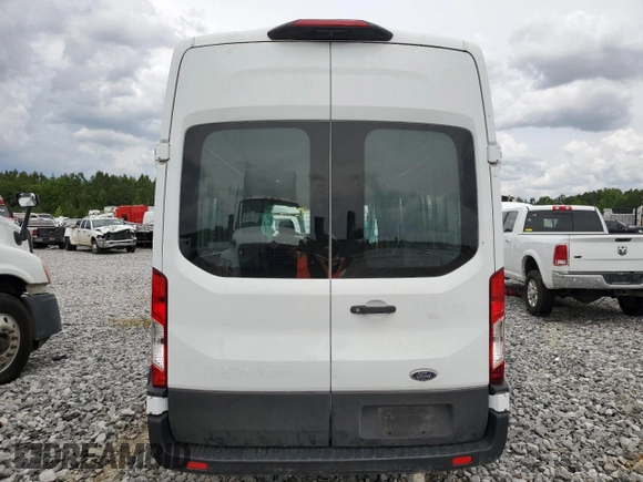 2021 Ford Transit Cargo z VIN 1FTBR3X81MKA18089, wystawiony jako Copart lot #53287124 z przebiegiem Nie podano mil oraz Czysty tytuł • Clean title. Historia ofert i sprzedaży dostępna na DreamBid. Obrazek 6.