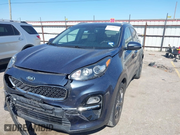 2021 Kia Sportage EX with VIN KNDPN3AC1M7889706, listed as a IAAI auction lot 41948559 with 52,329 mi miles and . Bid and sale history available at DreamBid. Image 2.