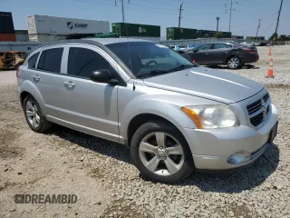 2010 Dodge Caliber Mainstreet z VIN 1B3CB3HA8AD565517, wystawiony jako Copart lot #60523535 z przebiegiem 99 982 mil mil oraz Szkoda całkowita • Salvage title. Historia ofert i sprzedaży dostępna na DreamBid. Obrazek 4.