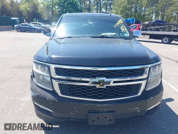 2015 Chevrolet Suburban LT with VIN 1GNSKJKC5FR275357, listed as a IAAI auction lot 42229934 with 359,009 mi miles and . Bid and sale history available at DreamBid. Image 12.