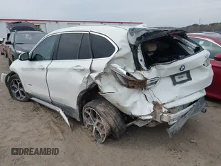 2018 BMW X1 xDrive28i with VIN WBXHT3C31J5K22765, listed as a IAAI auction lot 41800397 with 110,205 mi miles and . Bid and sale history available at DreamBid. Image 3.