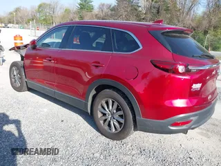2019 Mazda CX-9 Touring with VIN JM3TCACY0K0310851, listed as a IAAI auction lot 42066395 with 91,046 mi miles and . Bid and sale history available at DreamBid. Image 3.