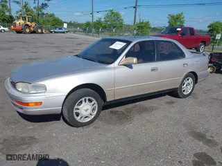 1994 Toyota Camry XLE with VIN 4T1GK13E1RU045195, listed as a IAAI auction lot 41715494 with 177,236 mi miles. Bid and sale history available at carsss.com. Image 2.
