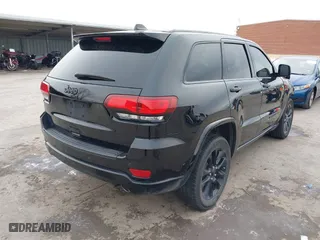 2021 Jeep Grand Cherokee Laredo X with VIN 1C4RJEAG2MC658324, listed as a IAAI auction lot 41620940 with 47,671 mi miles. Bid and sale history available at carsss.com. Image 4.