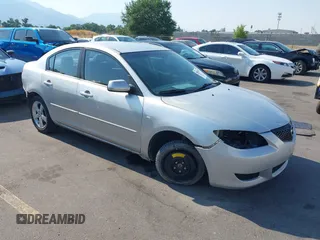 2006 Mazda Mazda3 i with VIN JM1BK12G861534885, listed as a IAAI auction lot 39860656 with 203,722 mi miles. Bid and sale history available at carsss.com. Image 1.