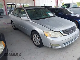 2001 Toyota Avalon XL z VIN 4T1BF28B71U120831, wystawiony jako IAAI lot #42299159 z przebiegiem 220 936 mil mil oraz . Historia ofert i sprzedaży dostępna na DreamBid. Obrazek 1.