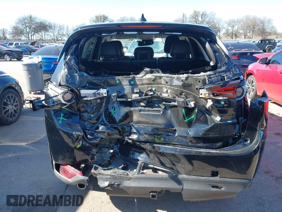2021 Mazda CX-5 Grand Touring with VIN JM3KFADM1M0406098, listed as a IAAI auction lot 41654735 with 33,050 mi miles. Bid and sale history available at carsss.com. Image 6.