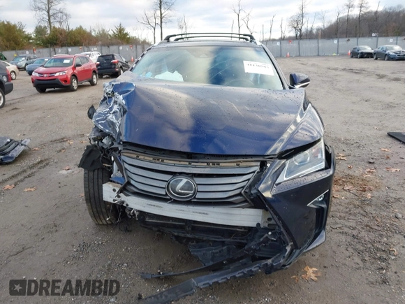 2017 Lexus RX with VIN 2T2BZMCAXHC063422, listed as a IAAI auction lot 41130585 with 63,883 mi miles. Bid and sale history available at carsss.com. Image 12.