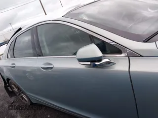 2014 Lincoln MKZ Hybrid with VIN 3LN6L2LU2ER813239, listed as a IAAI auction lot 42191138 with 126,082 mi miles and . Bid and sale history available at DreamBid. Image 12.