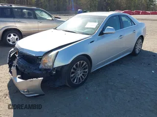 2013 Cadillac CTS Premium with VIN 1G6DP5E33D0175817, listed as a IAAI auction lot 41882197 with 116,645 mi miles and . Bid and sale history available at DreamBid. Image 2.