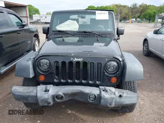 2010 Jeep Wrangler Sport with VIN 1J4AA2D10AL176363, listed as a IAAI auction lot 41955063 with 149,837 mi miles and . Bid and sale history available at carsss.com. Image 6.