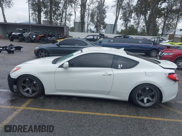 2011 Hyundai Genesis Coupe z VIN KMHHT6KD0BU059084, wystawiony jako IAAI lot #41776762 z przebiegiem 149 115 mil mil oraz . Historia ofert i sprzedaży dostępna na DreamBid. Obrazek 14.